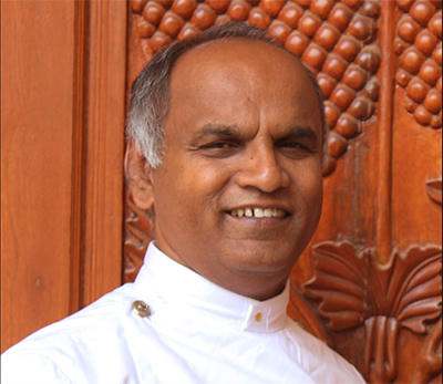 Rev Moni Mathew